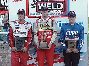 O'Reilly Tulsa 100 winner Bud Kaeding is flanked by runner-up J.J. 